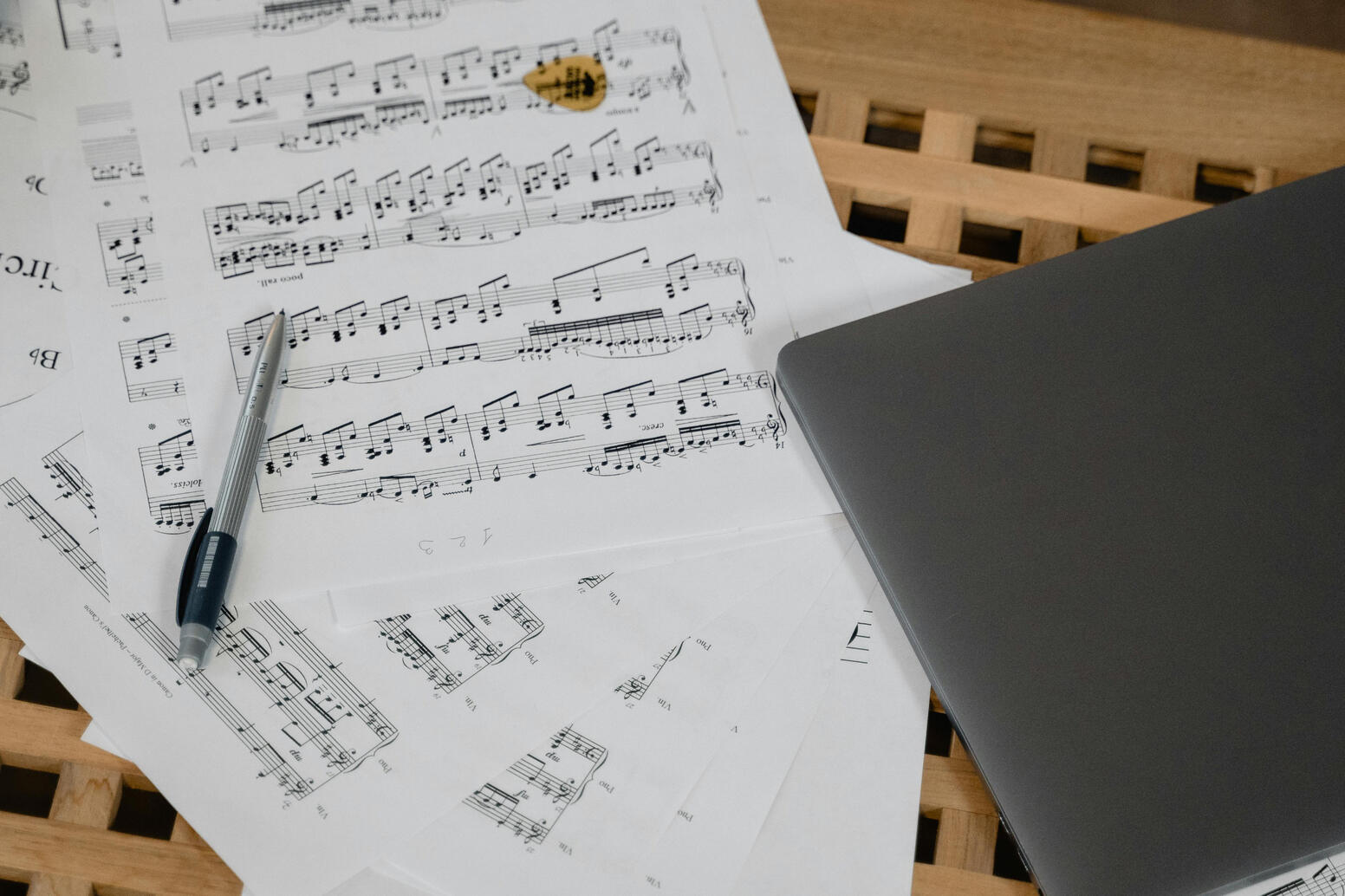 Photo by Tima Miroshnichenko: https://www.pexels.com/photo/laptop-and-music-sheets-on-wooden-surface-6670749/